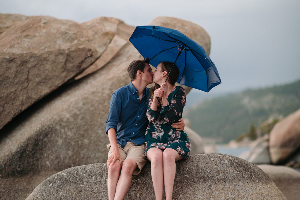 Couple with umbrella at Sand Harbor, Lake Tahoe